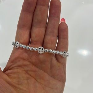 Lisa Gozlan happy face mixer bracelet.